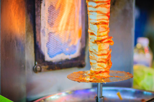 Bangkok, Thailand - March 2, 2017:  Street vendor is selling grilled kebab, the popular street foods at Khao San Road night market, Bangkok, Thailand.