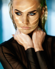 portrait of a sexy fashionable girl in a bathing suit