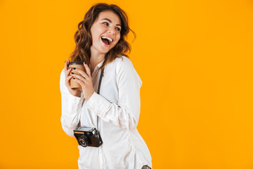 Portrait of a cheerful young woman wearing white shirt