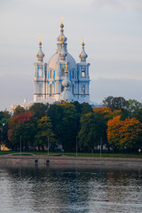 View of the Smolny Cathedral in the early morning mornings from the right bank of the Neva. St. Petersburg. Russia