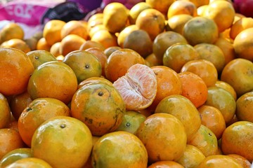 Naklejka na ściany i meble Orange fruit at street food