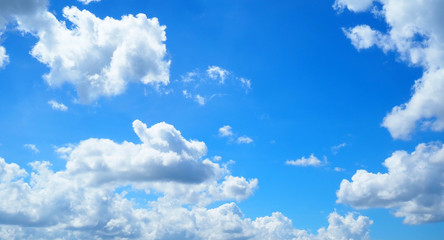 Naklejka na ściany i meble Blue sky and clouds background.