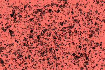 Bright black random round paint splashes on coral background Color splash and drop pattern  Abstract colorful texture