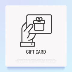 Hand with gift card. Certificate for purchase, discount, coupon. Thin line icon. Modern vector illustration of present for Christmas, Valentine day or birthday.