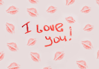 I love you. A message written by lipstick. Love card with lip prints