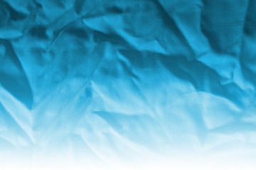 Obraz premium Ocean blue textile background. Silk cloth texture. Fabric pattern.