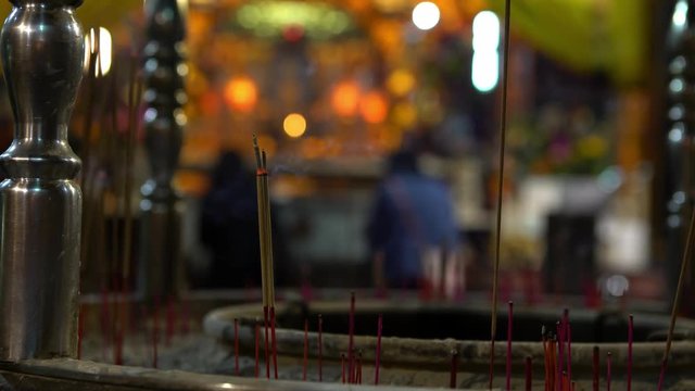 4K, Incense burning in Taiwan first temple of heaven. God of Jade Emperor, deities in Taoist faith. People praying in temples with incenses sticks. Taiwanese folk religion for make wish-Dan