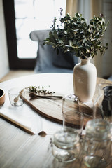 still life kitchen table, wooden board, vase