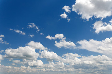 Naklejka na ściany i meble many white clouds against the blue sky