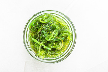 Wakame seaweed salad with sesame seed. Traditional Japanese food.