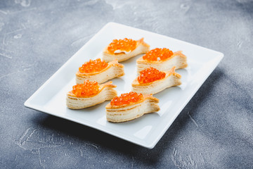 Delicious appetizer with red caviar.