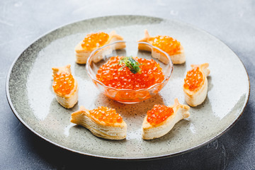 Delicious appetizer with red caviar.