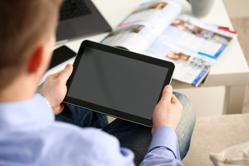 Businessman arm using modern pc pad closeup