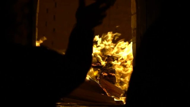 Slow Motion of people burning joss paper in ancient asian temple Taiwan. Temples are a place of worship. Taiwanese folk religion for make wish. People praying buddha with incenses sticks-Dan