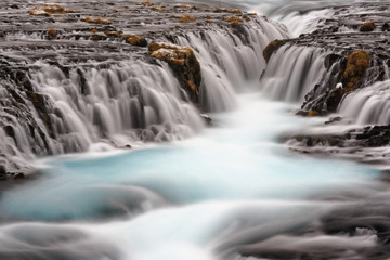 Fototapeta premium The cascading Bruarfoss Waterfall in Iceland