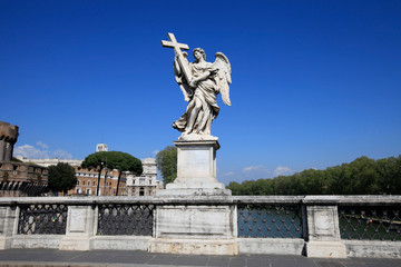 Statue on the Saint Angelo bridge over the Tiber river in Rome, Italy