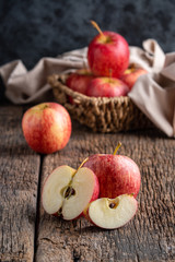 Green apples on wooden background.