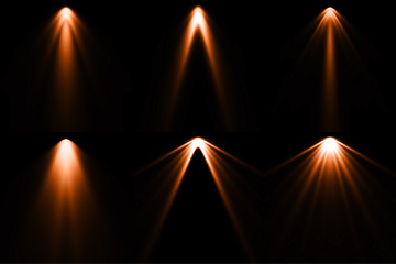 Fototapeta na wymiar Isolated orange spotlight effect on black background. Light show. Light from the top clipart.