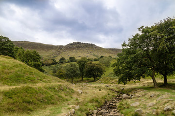 Fototapeta na wymiar Rural landscape with steep limestone valleys at the Peak District National Park is in central England. 