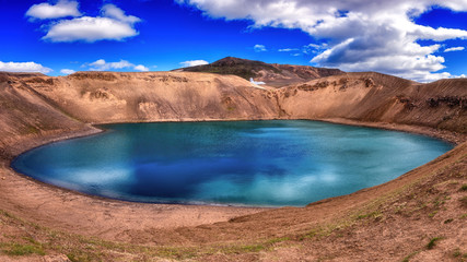 Amazing nature landscape, Viti crater in Krafla caldera, lake with emerald blue colored water, geothermal volcanic area in the northern Iceland, Myvatn region. Scenic panoramic view, outdoor travel