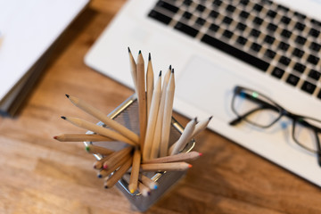 pencils and laptop