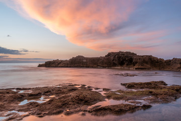 Fototapeta premium Long Exposure of the Mediterranean Sea Coast in Southern Italy at Sunset
