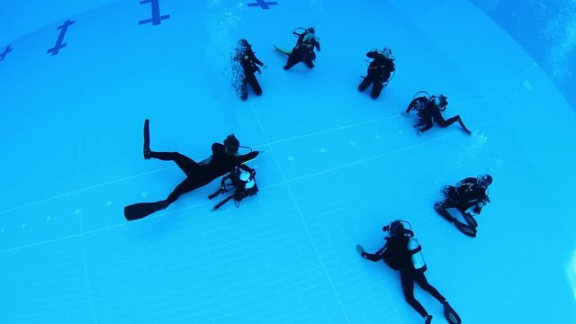Children learning to scuba dive as a recreational activity