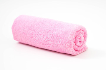 rolled up pink towel isolated