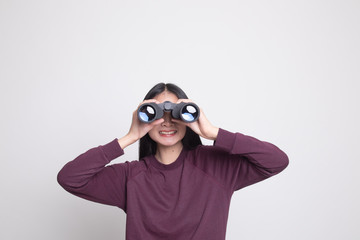 Young Asian woman with binoculars.