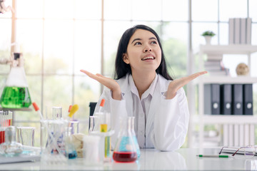 Portrait of Asian scientist in science room..