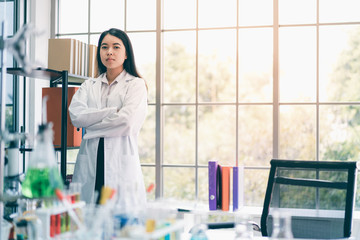 Portrait of Asian scientist in science room..