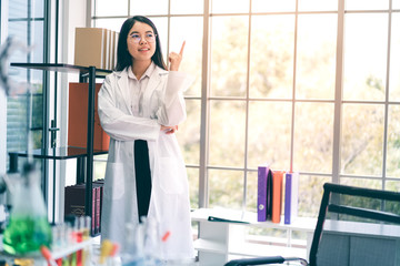 Portrait of Asian scientist in science room..