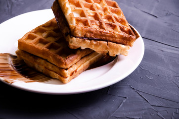 Viennese waffles with chocolate and cream topping