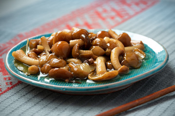 Marinated honey agaric in the plate.
