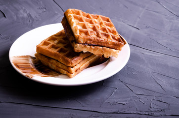 Viennese waffles with chocolate and cream topping
