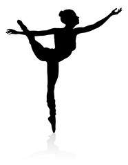 Silhouette ballet dancer woman dancing in a pose or position © Christos Georghiou
