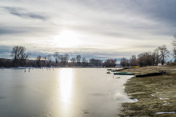 Sunset over the lake in the winter