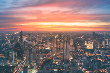 Fototapeta premium Bangkok city river curved skyline with sunset light.
