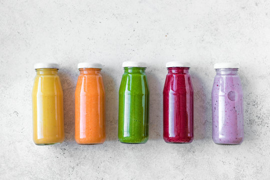 Colorful smoothies bottles