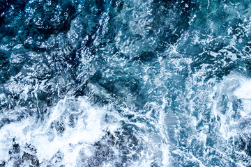 Blue deep sea foaming water background