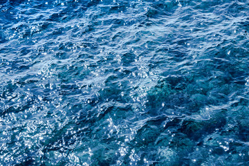 Blue deep sea foaming water background
