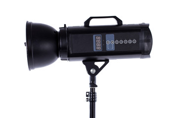 Head of studio flash strobe lamp light. Side view professional studio photography lighting close up. Isolated on white background.
