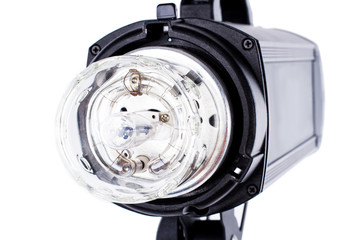 Photo studio strobe light flash bulb. Close up view of professional studio strobe flash lamp...