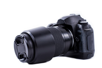 Fototapeta premium Professional photo camera isolated on white. Dslr camera, horizontal image. Professional photo studio concept.
