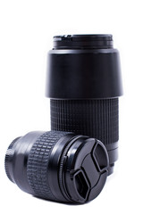 Digital camera lens, vertical image. Two photo camera lens isolated on white background. High...