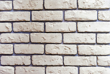 Obraz premium The texture of light yellow bricks for decoration of the facade of the building or interior.