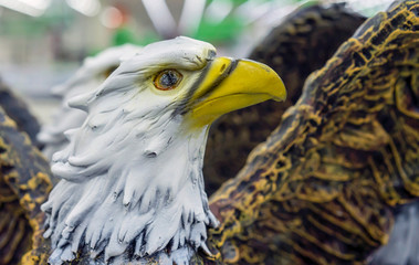 Ceramic statuette of bald eagle in a souvenir shop.