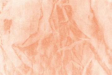 Elegant orange textile background. Silk cloth texture. Fabric pattern.