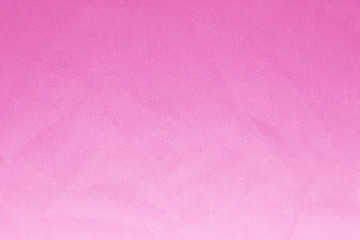 Elegant pink textile background. Silk cloth texture. Fabric pattern.
