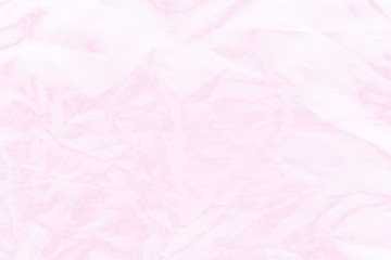 Elegant pink textile background. Silk cloth texture. Fabric pattern.